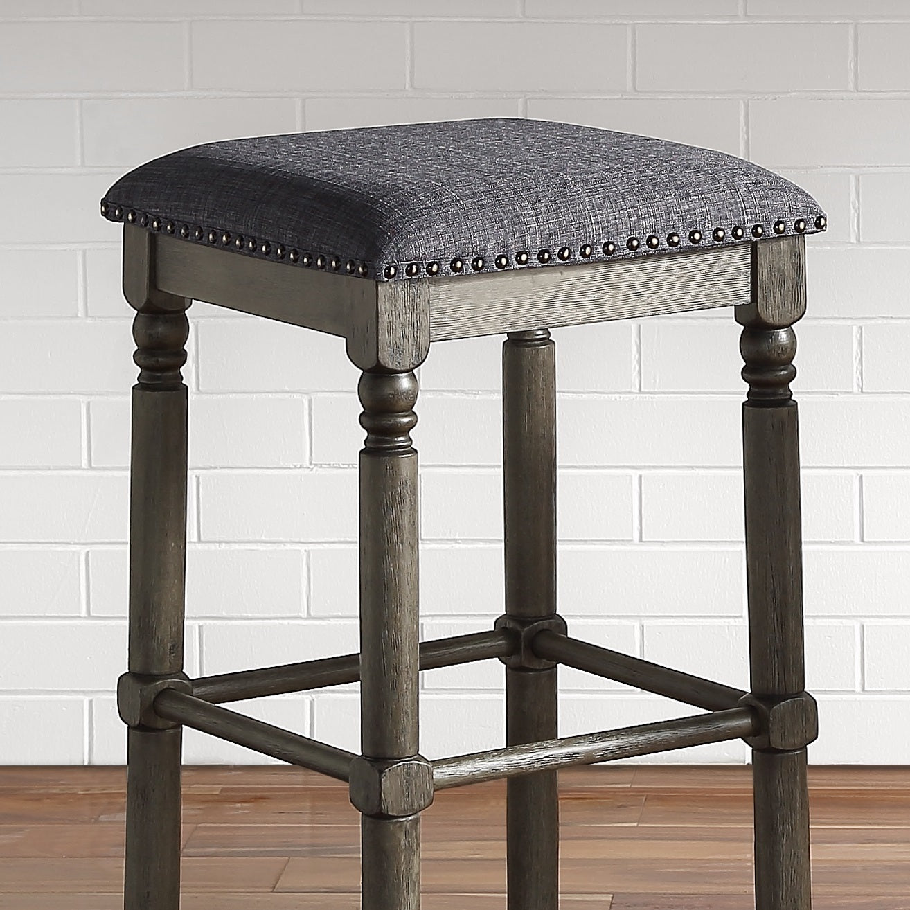 Sylphira - Set of 2 - 26" Grey Upholstered Wood Swivel Counter Height Stools with Bronze Nailhead Trim