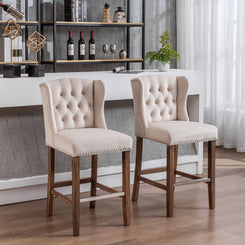 Vyrellr - Set of 2 - 27" Wingback Counter Height Bar Stools with Beige Velvet Upholstered Seat, Tufted Backrest, Nailhead Trim, and Wood Legs