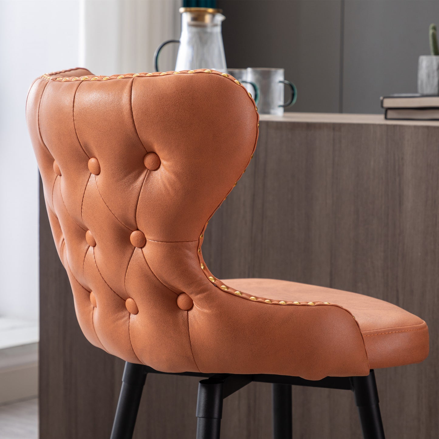 Vera - Set of 2 - Orange 25" Counter Height Swivel Bar Stools with Tufted Leathaire Fabric, Gold Nailhead Trim, and Black Metal Legs